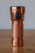 The Mateminco MT07 in copper is incredibly heavy and one of the most beautiful flashlights I own. The copper is coated and should stay shiny while used. The head on my MT07 was not coated so it gets darker with handling. With battery the MT07 weighs a whopping half kilogramm. If you take it be prepared that it is much heavier than it looks.  The Mateminco MT07 copper shouldn't be missing in any good flashlight collection. It impresses anyone who sees it. The SST20 in 4000K with 95 CRI is gorgeous as well. . It has a much better color rendition and is nice to look at. The flashlight arrived well protected and the shipping was fast with tracking all the way.